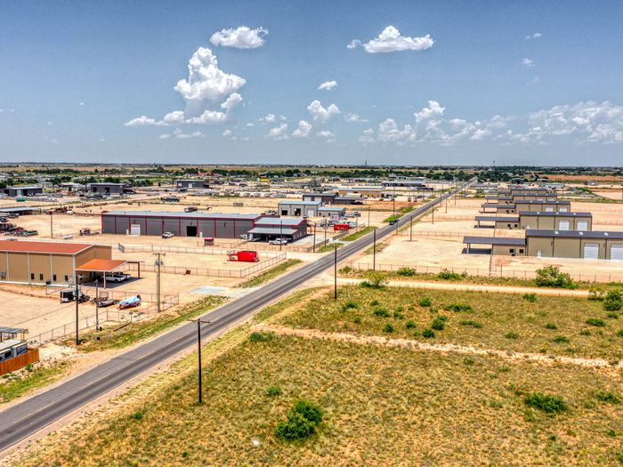 County Road 140 and the industrial yards south of Midland
