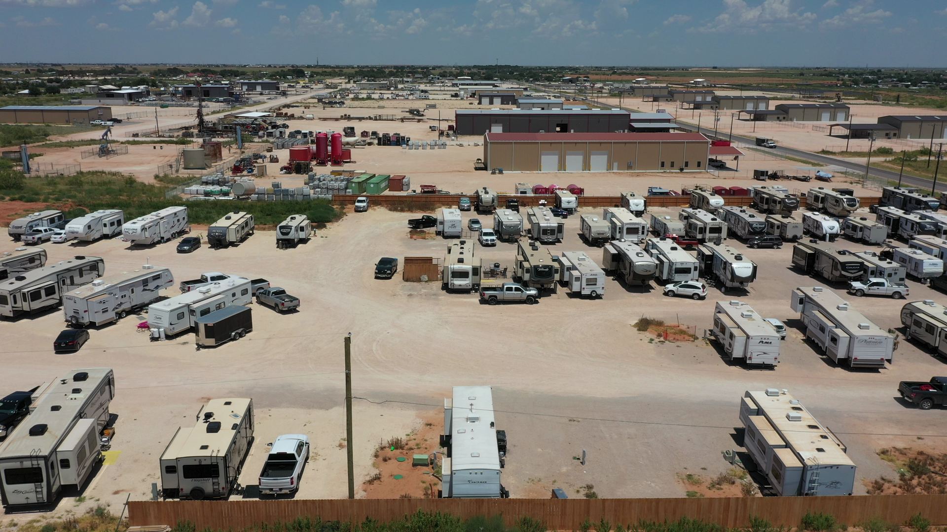 Drone view over Rangers RV Park, with the Midland oilfield on the horizon